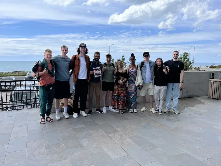 Group photo by the ocean