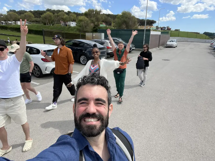 Walking to the beach, arms up