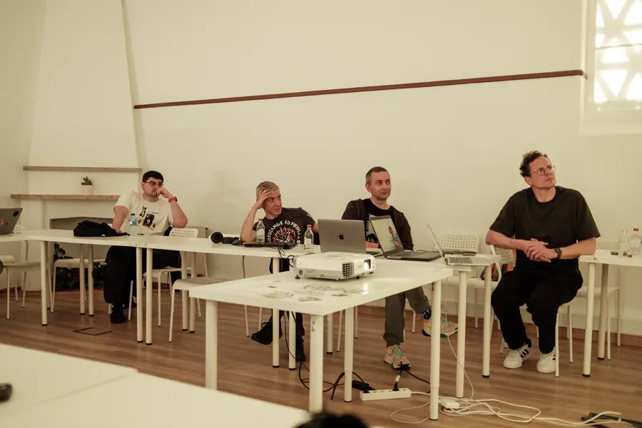 Attendees listening to a talk